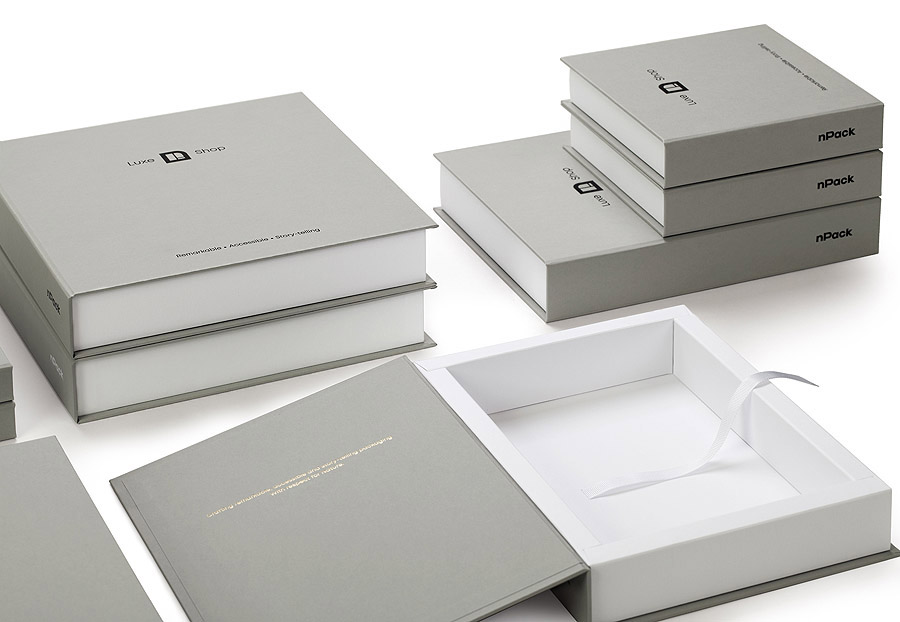 Branded presentation boxes in Colorplan Real Grey Buckram embossing
