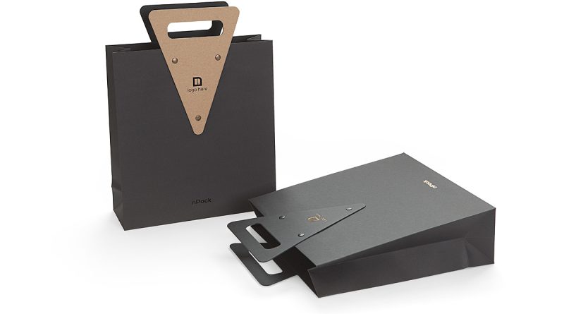 Exclusive gift bag with riveted die cut handle Koehler Brilliant and SH recycled paper