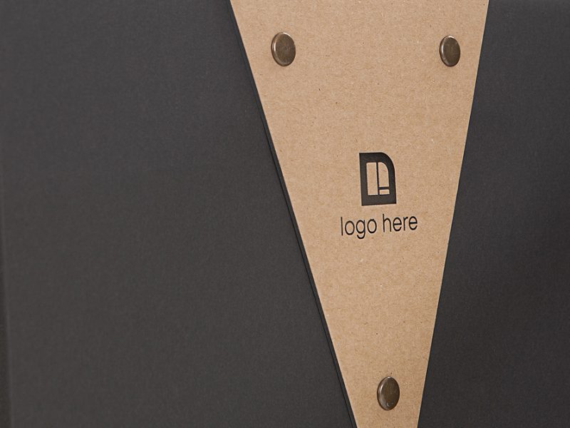 Koehler Brilliant Black paper and SH recycled brown paper riveted die-cut handle hot foiled logo