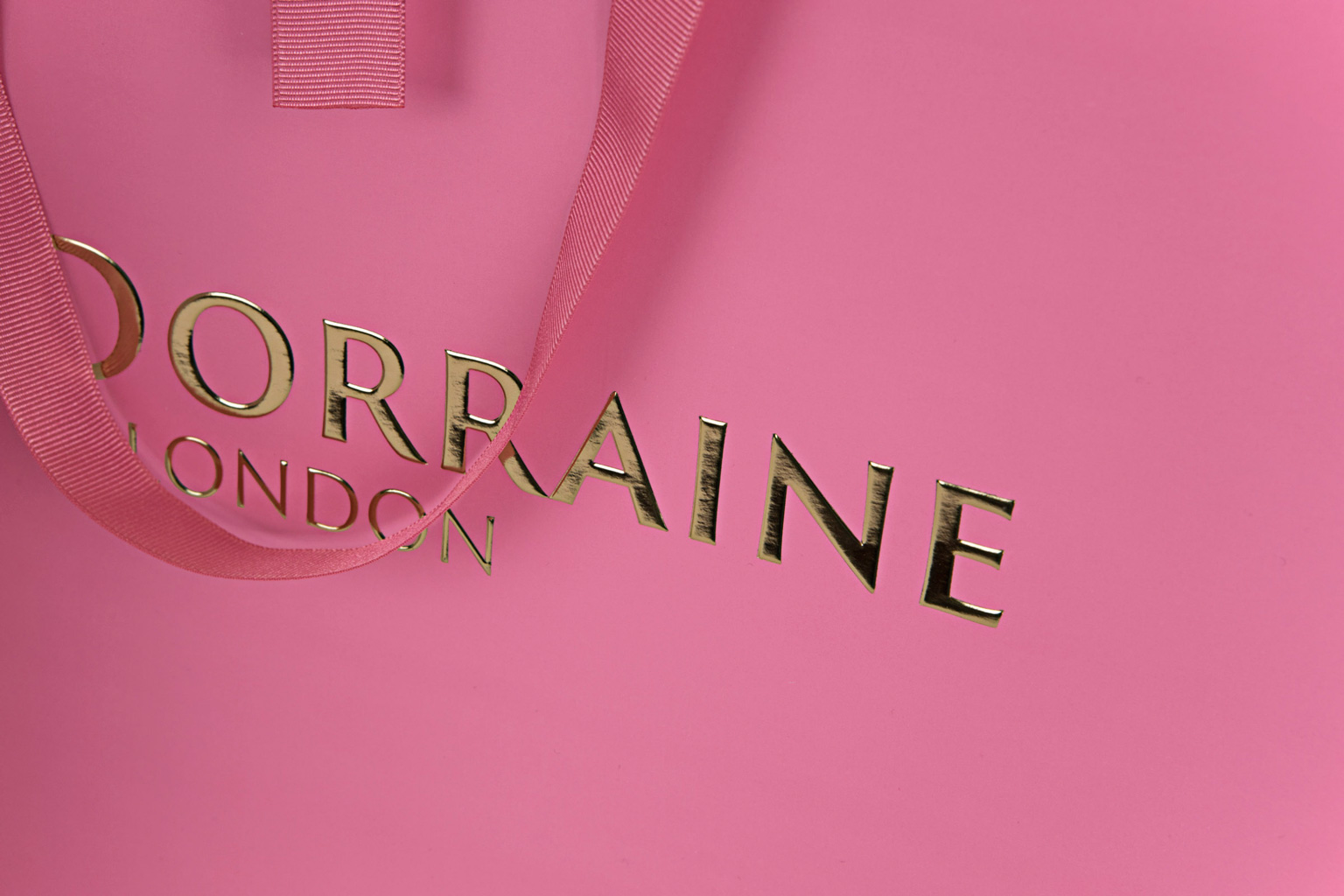 Luxury paper bag for fine garments Tia Dorraine